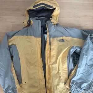 The North Face women’s Performance Jacket in Yellow and Gray